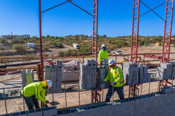 These masons are working towards building in a buildid in Las Vegas, Nevada. Hirschi Masonry of Las Vegas, Nevada
