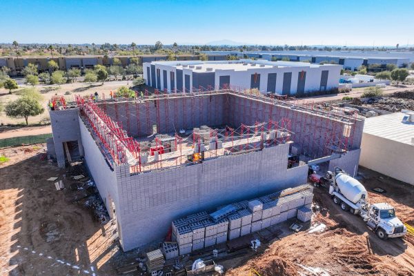 This building is being built by many people, along with some bricks. Hirschi Masonry of Las Vegas, Nevada