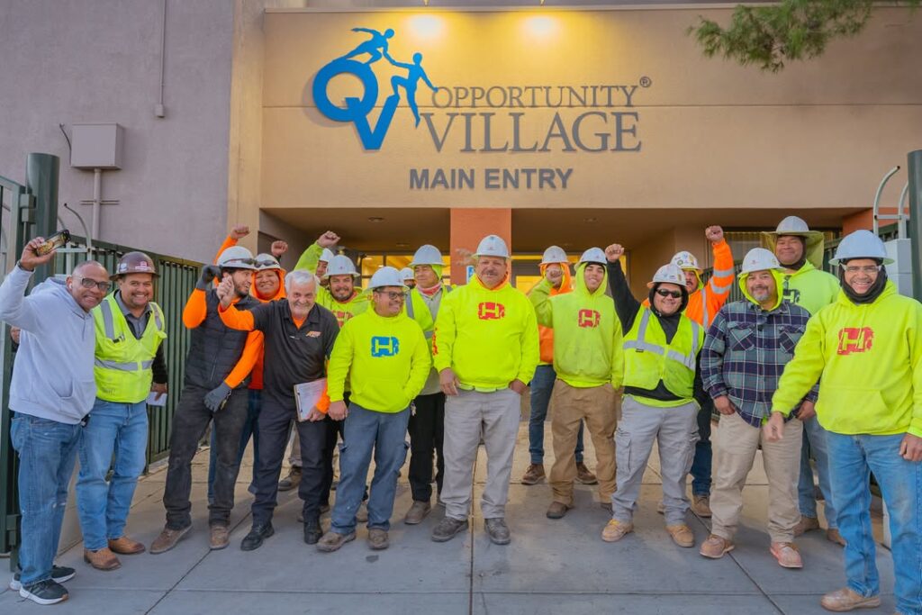 The company of Hirschi Masonry in Las Vegas, Nevada, cheers as they serve the Opportunity Village.